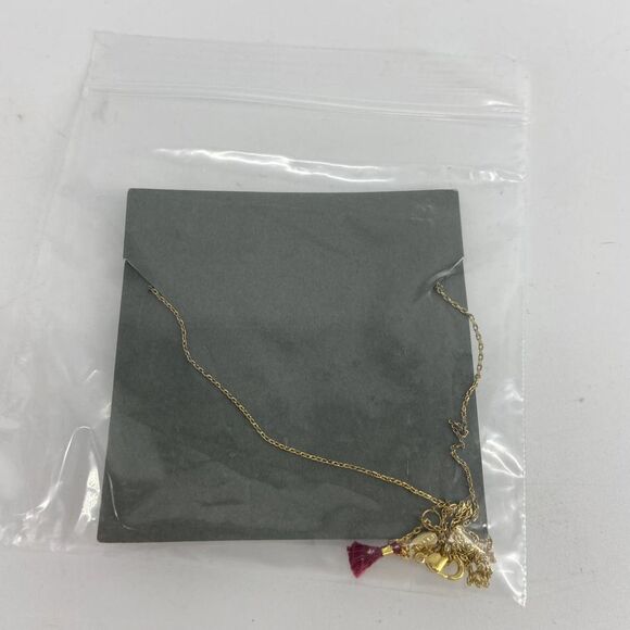 Shashi Gold Plated Cowrie Shell Charm Pendant Baltic Necklace 15.75" - 18" - Picture 3 of 3